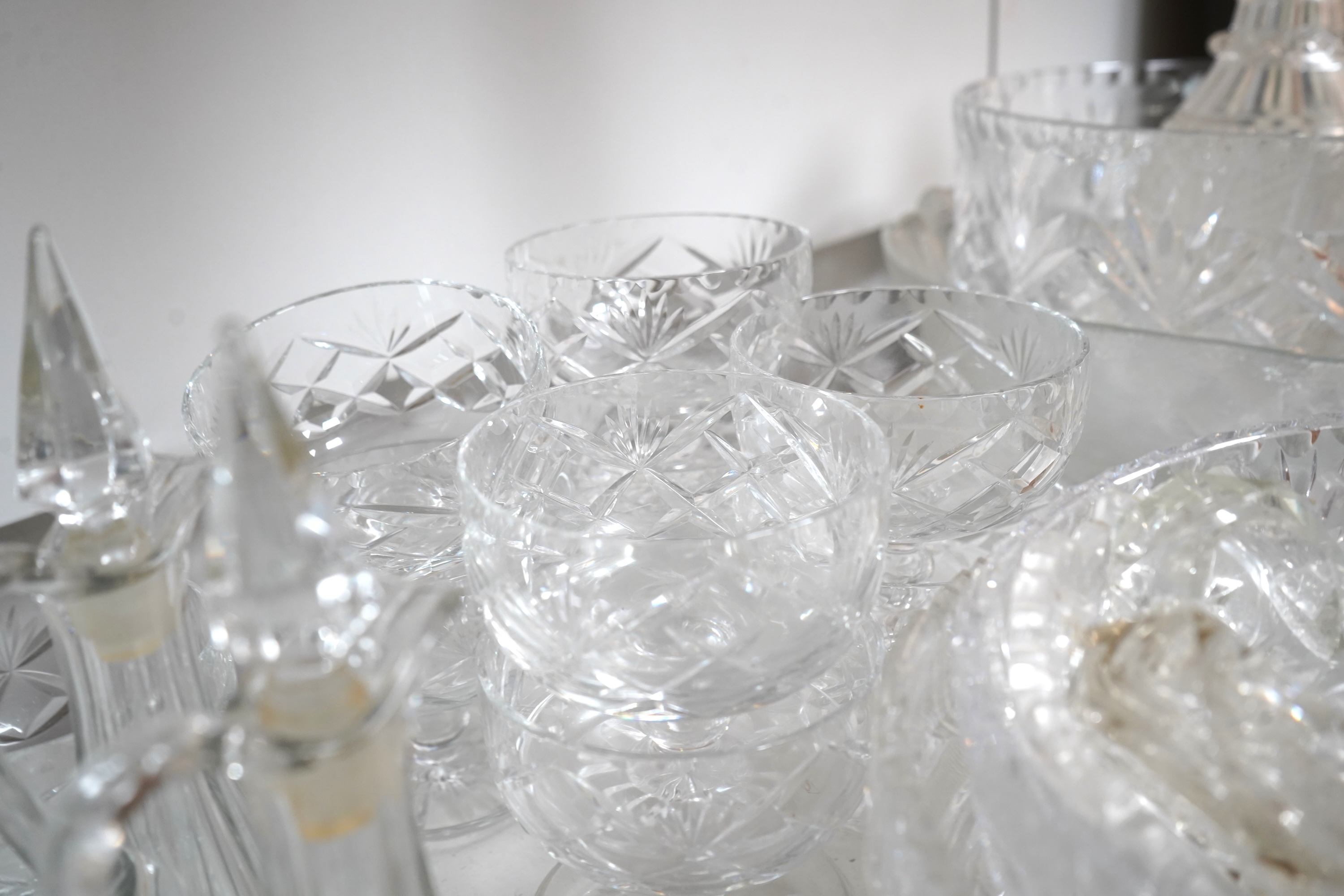 A collection of various cut glass